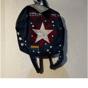 NWT Disney denim backpack
Denim  purse, backpack, pride flag on the corner